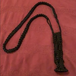 Macramé bottle holder